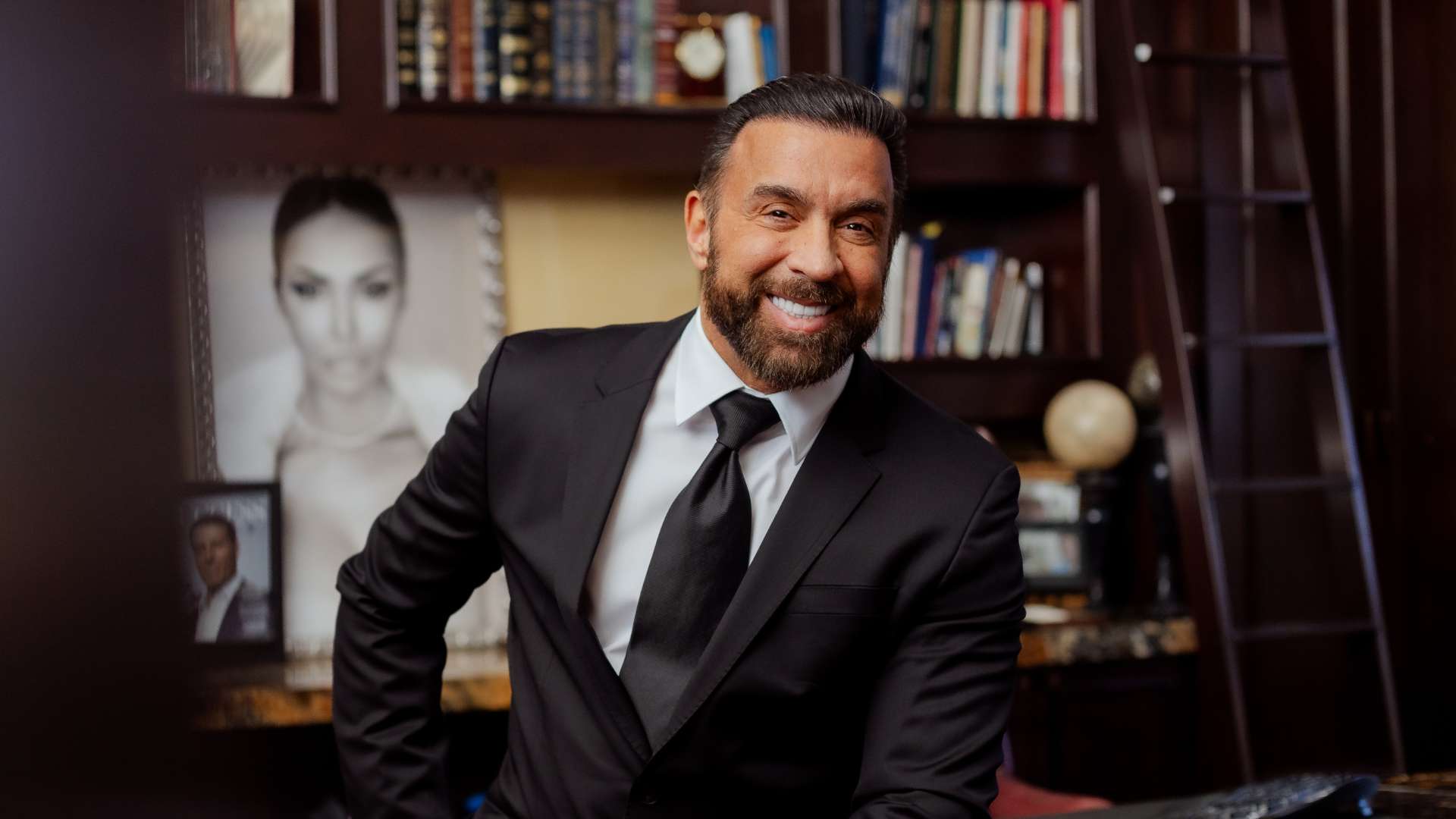 Dr Stile at His Desk Smiling Plastic Surgeon Las Vegas